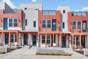 View of front of property featuring a balcony