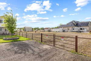 View of yard featuring a storage shed