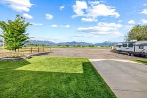 View of yard with a mountain view