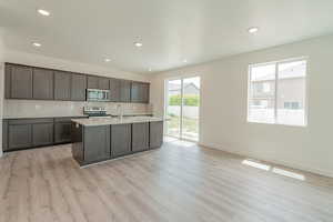 Kitchen and Dining Area*Photos of like floorplan with similar finishes