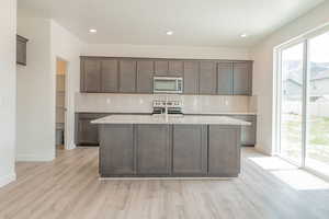 Kitchen with Flagstone Cabinets*Photos of like floorplan with similar finishes