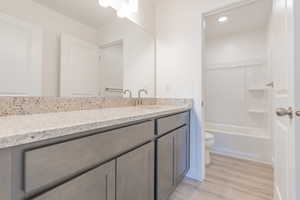 Shared Bathroom*Photos of like floorplan with similar finishes