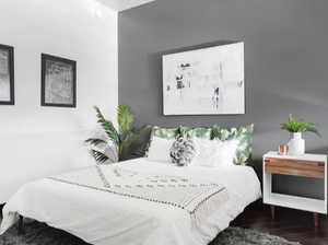 Bedroom featuring hardwood / wood-style flooring