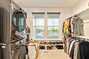 Owner's Suite features a large walk-in closet with washer and dryer; additional laundry room on level 2