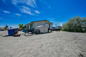 View of outdoor structure with a garage