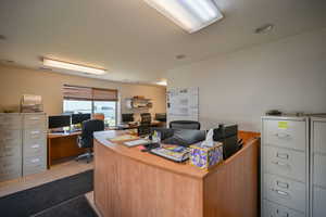 Home office featuring tile floors