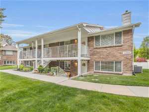 Lower level condo with outside seating area, BBQ's allowed!