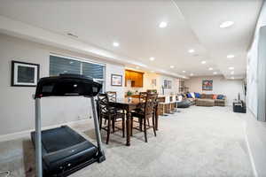 Basement workout area, dining room and basement great room