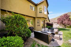 View of patio / terrace with a grill and an outdoor living space