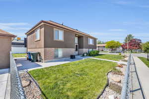 Exterior space featuring a front yard