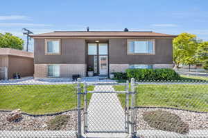 View of front of house with a front yard