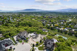 Drone / aerial view featuring a lake view