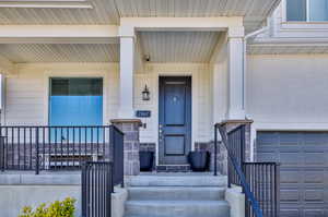 Property entrance with a garage