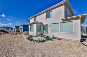 Rear view of house with a patio area