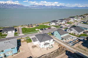 Aerial view featuring a water and mountain view