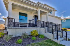 View of front of property with a porch