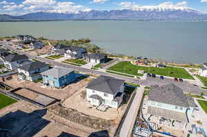 Bird's eye view featuring a water and mountain view