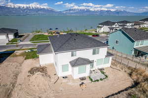 Bird's eye view featuring a water and mountain view