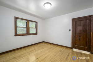 Empty room featuring light wood-type flooring