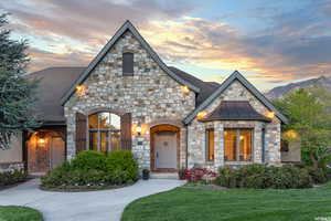 View of front of property featuring a yard