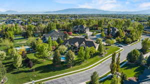 Birds eye view of property with a mountain view