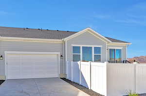 View of front of property with a garage