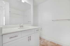 Bathroom with tile floors and vanity