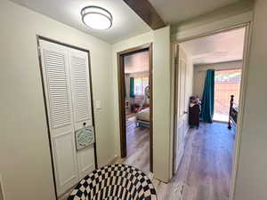 Corridor featuring light hardwood / wood-style floors