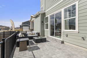 Model home - View of side patio/courtyard featuring an outdoor hangout area