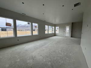 Living room and dining featuring a mountain views