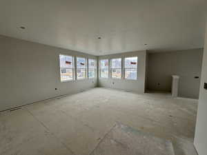 Large family room with dry bar and mountain views