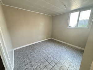 View of tiled empty room