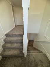 Staircase from main level to upstairs, 3 bedrooms/1bath