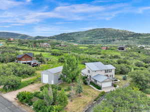 Drone / aerial view featuring a mountain view