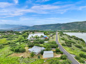 Aerial view with a water and mountain view