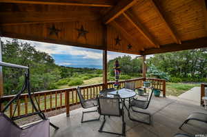 View of patio featuring a deck