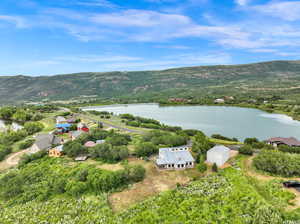 Bird's eye view featuring a water and mountain view