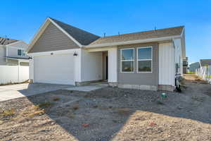 View of front facade with a garage