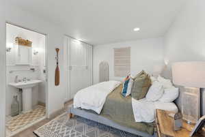 Bedroom featuring sink