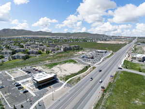 Birds eye view of property with a mountain view