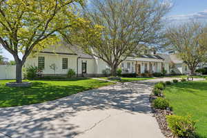 View of front of house with a front yard