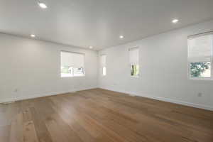 Spare room featuring hardwood / wood-style floors