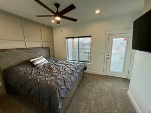 Bedroom with carpet floors, recessed lighting, multiple windows, and baseboards