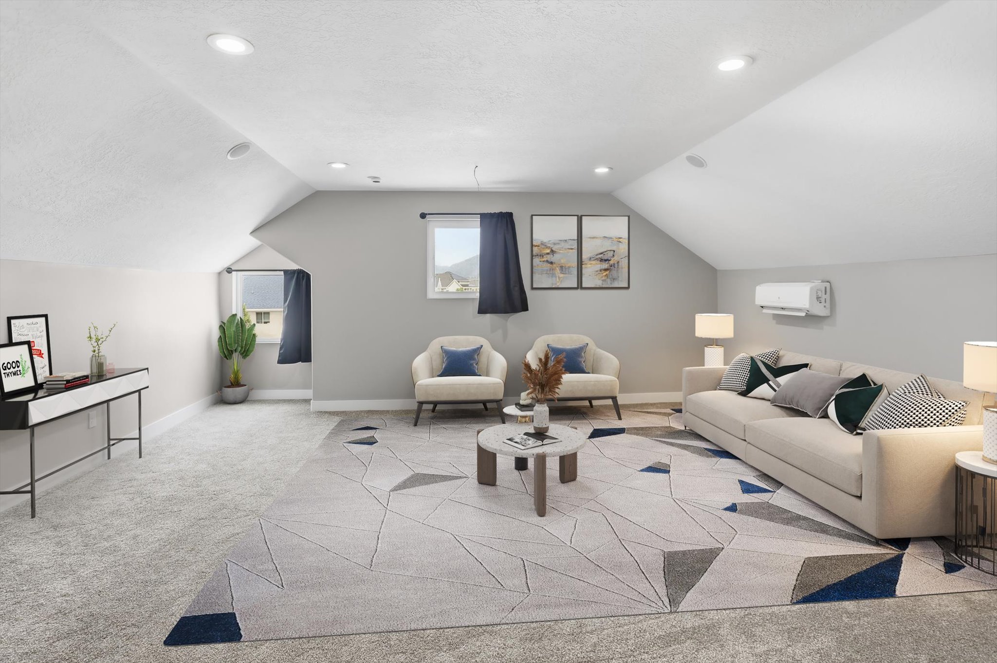 Spacious room with sloped ceilings and recessed lighting