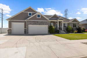 Craftsman house with a garage