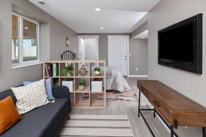 Living room featuring hardwood / wood-style flooring