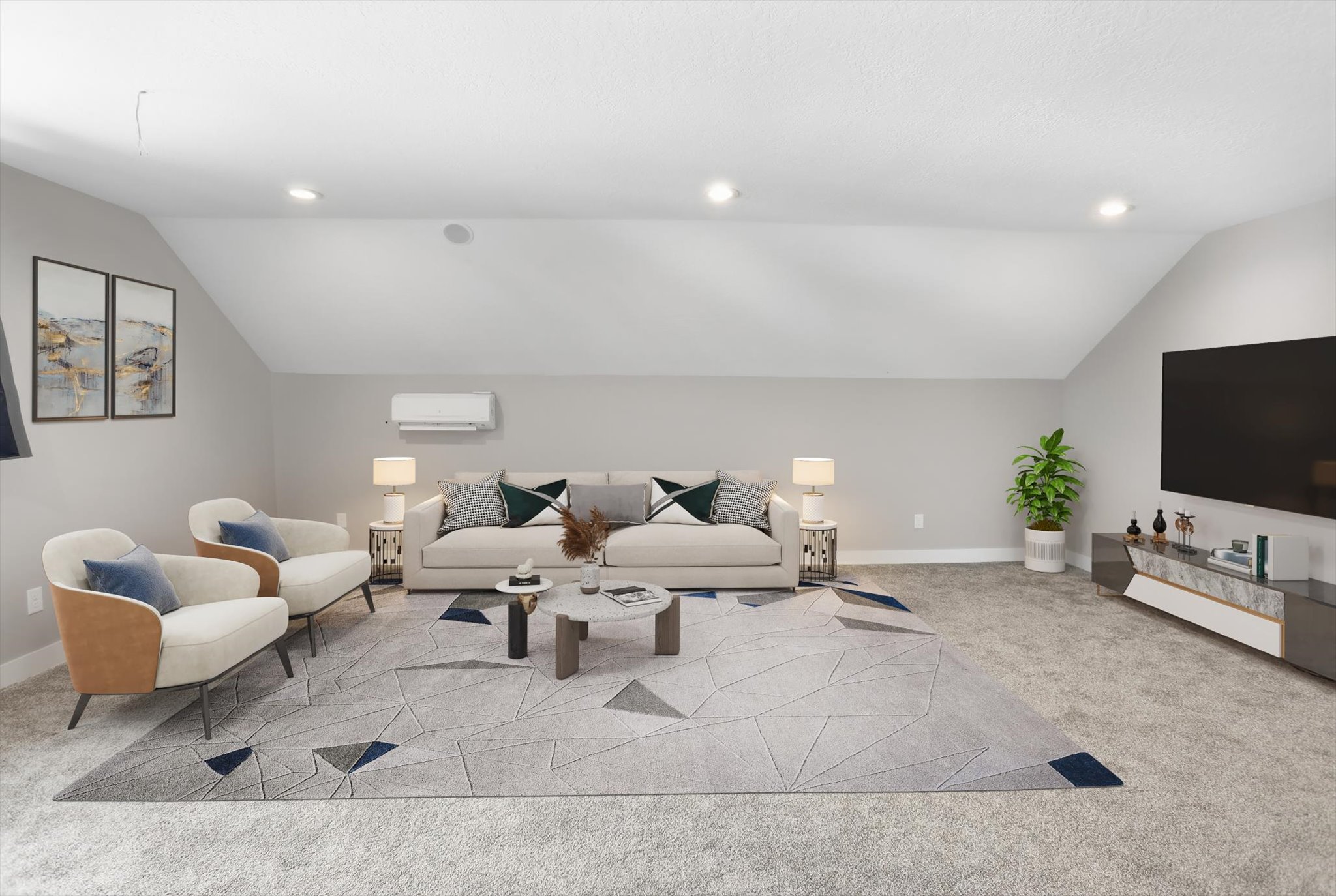 Spacious living area featuring sloped ceilings, recessed lighting, and carpeted flooring