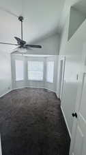 Interior space with vaulted ceiling and ceiling fan