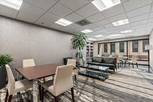 Dining room with a drop ceiling