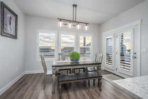 Dining space featuring dark hardwood / wood-style flooring